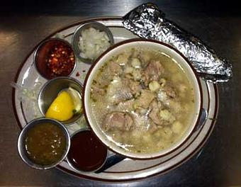 Product: A steaming bowl of tender pork, hominy, onions and spices slow simmered to perfection. served with choice of chile, chopped onions, crushed red pepper, lemon and lime wedges and 3 small flour tortillas. - Papa Felipe's in Albuquerque, NM Mexican Restaurants