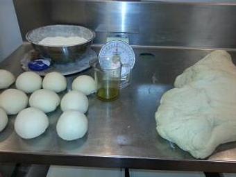 Product: Carefully weigh and form dough balls..... - Paparonni's Pizza in Madison County - Danielsville, GA Pizza Restaurant