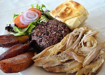 Product: Lechon (Grilled Pork) - Papi's Cuban & Caribbean Grill in Midtown, Old Fourth Ward - Atlanta, GA Caribbean Restaurants