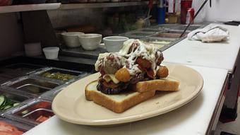 Product: A burger you can't refuse! - Parker's Restaurant in Drummond, MT American Restaurants