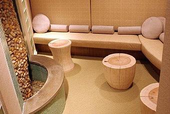 Product: Any guest that comes in for spa services is invited to decompress in our relaxation room complete with riverstone water feature. - Peter Conte Salon and Spa in Matawan, NJ Day Spas
