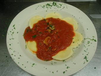 Product: Cheese Ravioli with homemade tomato sauce and fresh mushrooms - Piccola Italia Pizza and Restaurant in Raleigh, NC Italian Restaurants