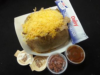 Product: Loaded BBQ Potato - Piggys Bar-b-Que Place in Tullahoma, TN Barbecue Restaurants