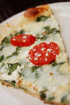 Product: A slice of Popeye & Olive Oil - Pizza Schmizza Pub & Grub in Cornell - Portland, OR Pizza Restaurant