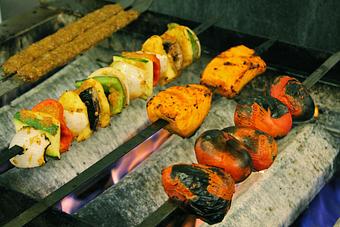 Product: Open-flame Grill - Pomegranate on Main in Greenville, SC Bars & Grills