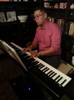 Product: Jake Beamer performing at our Sunday Brunch. - Ports Of Call in Downtown Historic Southport - Southport, NC Bars & Grills
