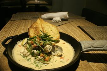Product: NEW ENGLAND STYLE CHOWDER CHALKED FULL OF FRESH SEAFOOD, CLAMS AND DUSTED WITH OLD BAY. SERVED WITH WARM BAGUETTE - PUBlic House in Old Town Temecula - Temecula, CA American Restaurants