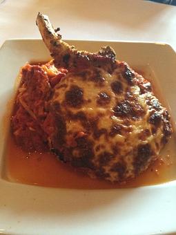 Product: Pork Chop Parmigian - Rachel's Cafe in Syosset, NY American Restaurants
