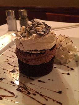Product: Triple Mousse Cake - Rachel's Cafe in Syosset, NY American Restaurants