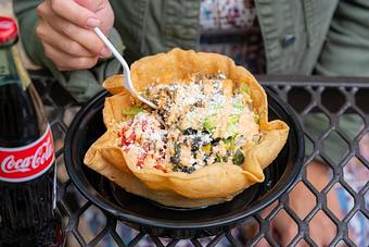 Product: CRISPY TORTILLA BOWL FILLED WITH LETTUCE, BLACK BEANS CORN SALSA, DICED TOMATO, AVOCADO, QUESO FRESCO, CHIPOTLE CAESAR DRESSING - Red Mesa Mercado in St. Petersburg, FL Mexican Restaurants