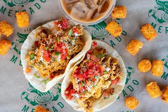 Product: SCRAMBLED EGGS AND MEXICAN CHORIZO, PICO DE GALLO, QUESO AND FRESH CILANTRO ON TWO HOUSE-MADE FLOUR TORTILLAS - Red Mesa Mercado in St. Petersburg, FL Mexican Restaurants