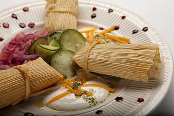 Product: Our Tamales are hand-made, not purchased from a distributor. Come taste the difference today! - Rolando's Restaurante in Downtown Fort Smith - Fort Smith, AR Mexican Restaurants
