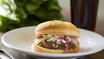 Product: Pulled Pork with Pickled Onions and Feta - Romaines in Missoula, MT American Restaurants