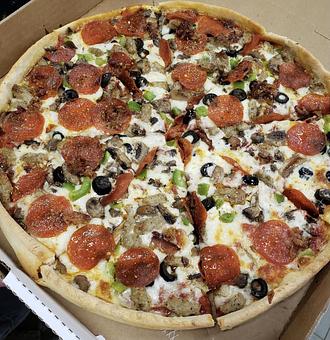 Product - Ropa's Chicago Style Pizza in Wausau, WI Pizza Restaurant