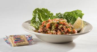 Product: Spicy Conch Salad - Rustic Inn Crabhouse in Fort Lauderdale, FL Seafood Restaurants