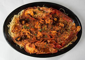Product: Lobster Fra Diavolo over Linguine - Rustic Inn Crabhouse in Fort Lauderdale, FL Seafood Restaurants