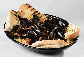 Product: PEI Mussels over Linguine - Rustic Inn Crabhouse in Fort Lauderdale, FL Seafood Restaurants