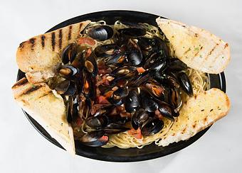 Product: PEI Mussels over Linguine - Rustic Inn Crabhouse in Fort Lauderdale, FL Seafood Restaurants