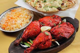 Product: Tandoori chicken and garlic naan - Saffron Indian Kitchen in Bala Cynwyd, PA Indian Restaurants
