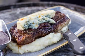 Product: 12 oz NY Strip Steak - Salty's on Alki in Alki Beach, West Seattle - Seattle, WA American Restaurants