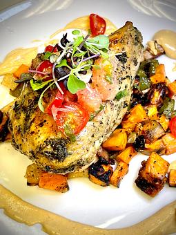 Product: Cast-Iron Seared Breast, Roasted Root Vegetable & Confit Hash, Florida Citrus Salsa, Smoky Paprika Hollandaise - Savour in Tallahassee, FL American Restaurants