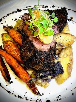 Product: Smashed Fingerling Potatoes, Sugarcane & Herb Heirloom Carrot, Cowboy Butter - Savour in Tallahassee, FL American Restaurants