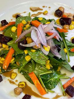 Product: Marinated Chick Peas, Charred Corn, Red Onions, Pickled Carrots, Dijon-Maple Vinaigrette - Savour in Tallahassee, FL American Restaurants