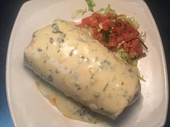 Product: Buttermilk fried Chicken, fresh Broccoli, roasted red peppers, and cilantro lime rice are simmered in our Espinaca dip, rolled into a giant tortilla, and baked, and topped with more Espinaca. - Shorty's Mexican Roadhouse in Nashua, NH Mexican Restaurants
