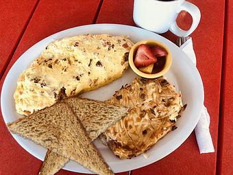 Product: Ham or Bacon and Cheese Omelet - Skillets - Bonita Springs - Sunshine Plaza in Bonita Springs, FL American Restaurants