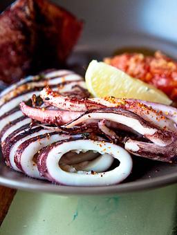 Product: Grilled Squid with Tomato Ginger Fondue - Skool in SOMA/Potrero Hill - San Francisco, CA Seafood Restaurants