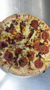 Product: hand toss pizza - Smitty's Overtime Inn in Tomah, WI Restaurants/Food & Dining