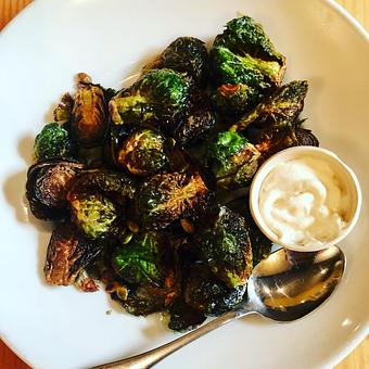 Product: Fried Brussels Sprouts with pumpkin seeds & a meyer lemon cream - on as a special - Speisekammer in Alameda, CA Bars & Grills