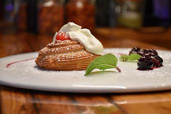 Product: Almond frangipane, pastry cream, rum sponge cake, whipped cream - Spiga Ristorante in Needham Heights, MA Italian Restaurants