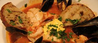 Product: Every winter our famous Bouillabaise comes back to the menu. Three kinds of seafood, saffron aioli, Pernod, crostini and a rich seafood broth. - Stellina in Watertown, MA Italian Restaurants