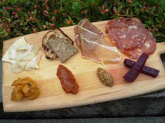 Product: Homemade Veal and Pistachio Terrine, thin slices of rare Blackened Beef Tenderloin Carpaccio, Tuscan Boar Sausage and Prosciutto di Parma. With condimenti, bread. - Stellina in Watertown, MA Italian Restaurants