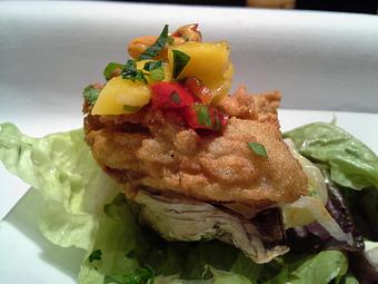 Product: Fat, juicy Chesapeake Bay oysters, mango salsa, chipotle aioli, cabbage slaw - Stellina in Watertown, MA Italian Restaurants