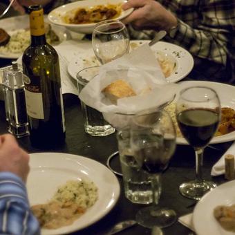 Product: A three-course regional Italian dinner is served family-style at each Stellina Sunday Night At The Opera - Stellina in Watertown, MA Italian Restaurants