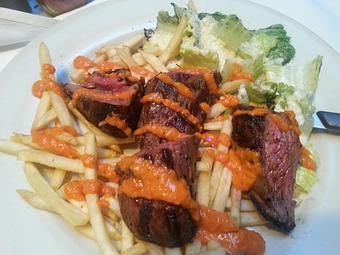 Product: Steak Frites; beef Tenderloin with grilled Caesar salad, fries and roasted red pepper aioli - Stellina in Watertown, MA Italian Restaurants