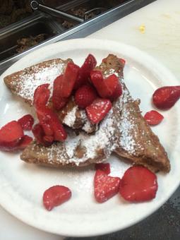 Product: Strawberry Cheesecake French Toast - Sour dough bread with sweetened cream cheese filling marinated in eggs, cinnamon, and vanilla topped with fresh strawberries and dusted with powdered sugar - Sunflower Cafe in Charleston, SC American Restaurants Product: Strawberry Cheesecake French Toast - Sour dough bread with sweetened cream cheese filling marinated in eggs, cinnamon, and vanilla topped with fresh strawberries and dusted with powdered sugar - Sunflower Cafe in Charleston, SC American Restaurants