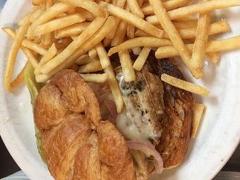 Product: Chicken Sandwich - Grilled chicken breast topped with caramelized onions and Boar's Head baby swiss cheese on a toasted croissant with basil dijionnaise - Sunflower Cafe in Charleston, SC American Restaurants Product: Chicken Sandwich - Grilled chicken breast topped with caramelized onions and Boar's Head baby swiss cheese on a toasted croissant with basil dijionnaise - Sunflower Cafe in Charleston, SC American Restaurants