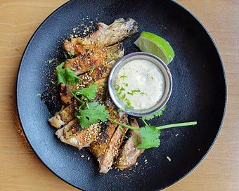 Product: tender and juicy chicken thighs grilled skin-on over binchotan charcoal and seasoned with signature S+P mix. sliced and served with lime kosho aioli. - Sushi San - Reservations in River North - Chicago, IL Japanese Restaurants