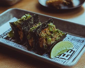 Product: spicy octopus "tacos" in crispy nori shells.  all are garnished with wasabi tobiko mayo, avocado puree, green onion, and togarashi ichimi - Sushi San - Reservations in River North - Chicago, IL Japanese Restaurants