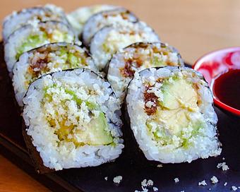 Product: creamy michoacan avocado rolled with sweet soy, yuzu mayo, and tempura crunch. topped with crunch and served with side of wasabi soy. available in 5 or 10 pieces. - Sushi San - Reservations in River North - Chicago, IL Japanese Restaurants