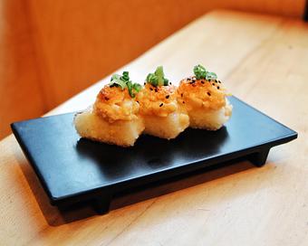 Product: crispy pressed rice topped with chopped scallop, spicy massago mayo, and black sesame seeds. available in 3 or 5 pieces. - Sushi San - Reservations in River North - Chicago, IL Japanese Restaurants