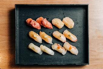Product: 12 pieces nigiri across 6 varieties of fish. selections rotate daily, though some staples like scallop and otoro are almost guaranteed to make an appearance. - Sushi San - Reservations in River North - Chicago, IL Japanese Restaurants