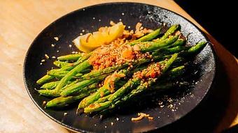 Product: spicy-savory and packed with flavor, our garlic chili vinaigrette is served atop  haricots verts and finished with sesame seeds and lemon. - Sushi San - Reservations in River North - Chicago, IL Japanese Restaurants