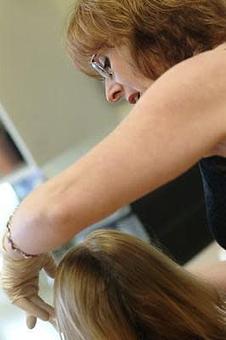 Product: Suz in action - Suz Pratt The Holistic Stylist in Ferguson Historic Business District ~ Jeske Park - Ferguson, MO Beauty Salons