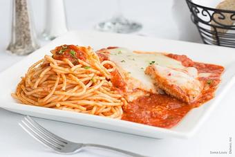 Product: Breaded chicken cutlet grilled and topped with melted mozzarella cheese and marinara sauce, served with pasta. - Swiss Louis in San Francisco, CA Restaurants/Food & Dining