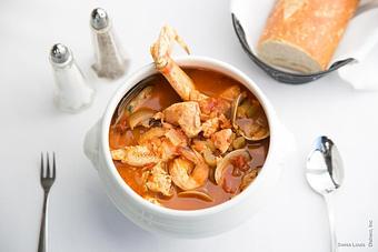 Product: A fisherman's stew of crab, clams, prawns, mussels and rock cod in a light cioppino sauce. - Swiss Louis in San Francisco, CA Restaurants/Food & Dining
