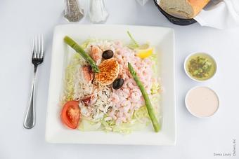 Product: Baby shrimp and dungeness crab meat served on a bed of shredded lettuce with olives and artichokes, topped with a Louis dressing. - Swiss Louis in San Francisco, CA Restaurants/Food & Dining